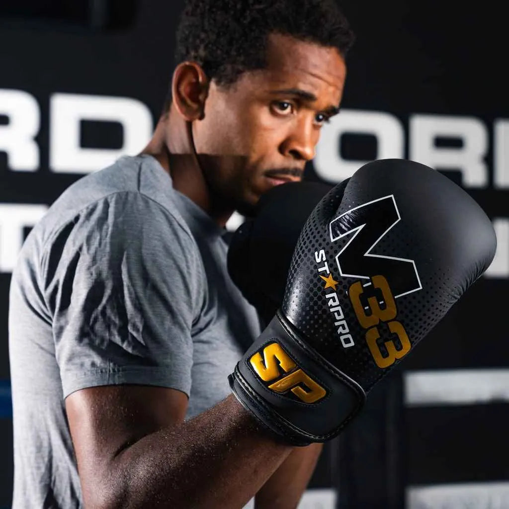 M33 sparring gloves 
Matt Black/Gold